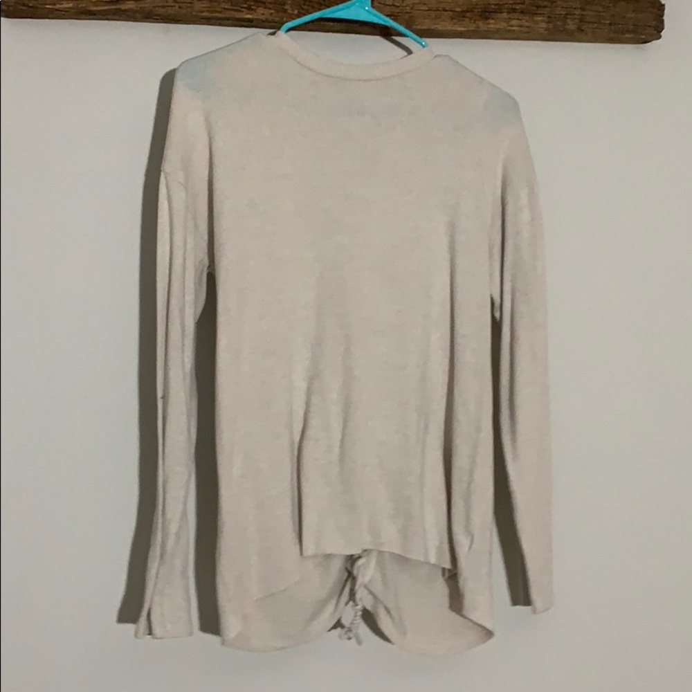 Basic front and tied back tan sweater
